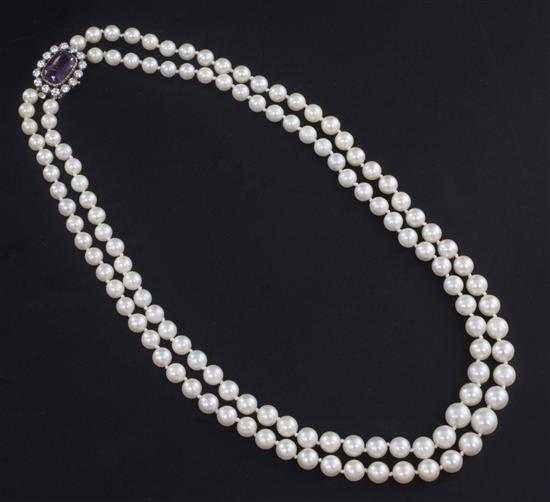 A double strand graduated cultured pearl choker necklace with gold, amethyst and white sapphire? set clasp, 48cm
